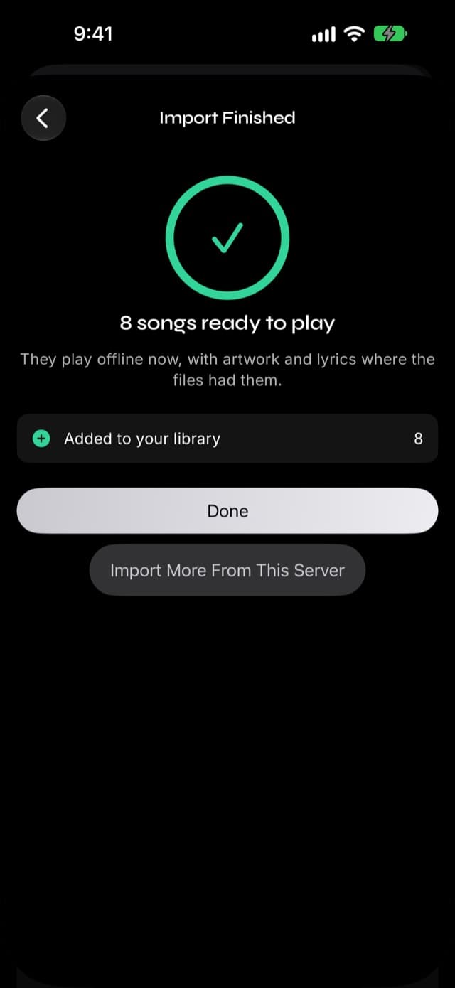 The import summary in Prismatic Music showing the number of songs added to the library and buttons for Done and Import More From This Server