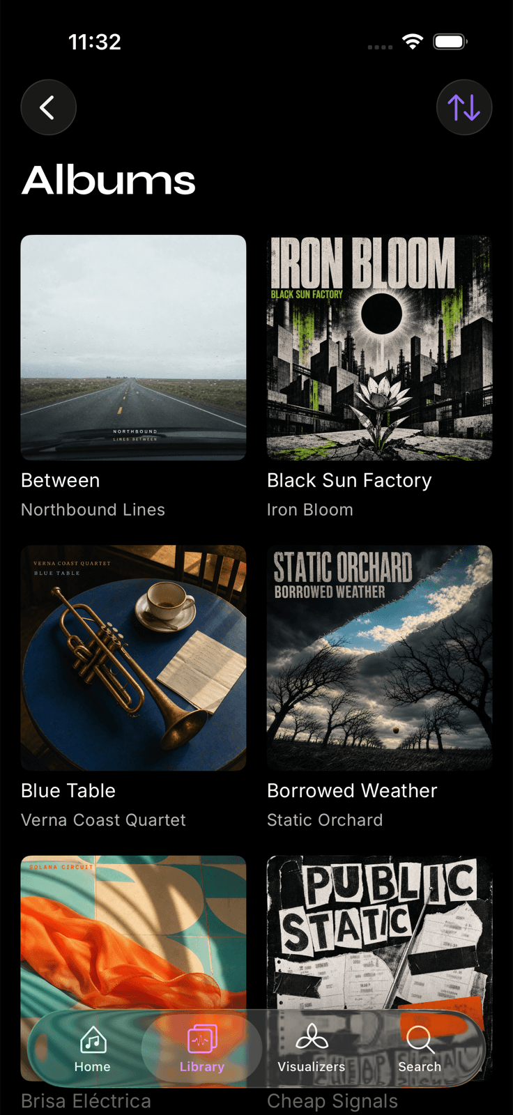 The Prismatic Music library showing imported albums with artwork